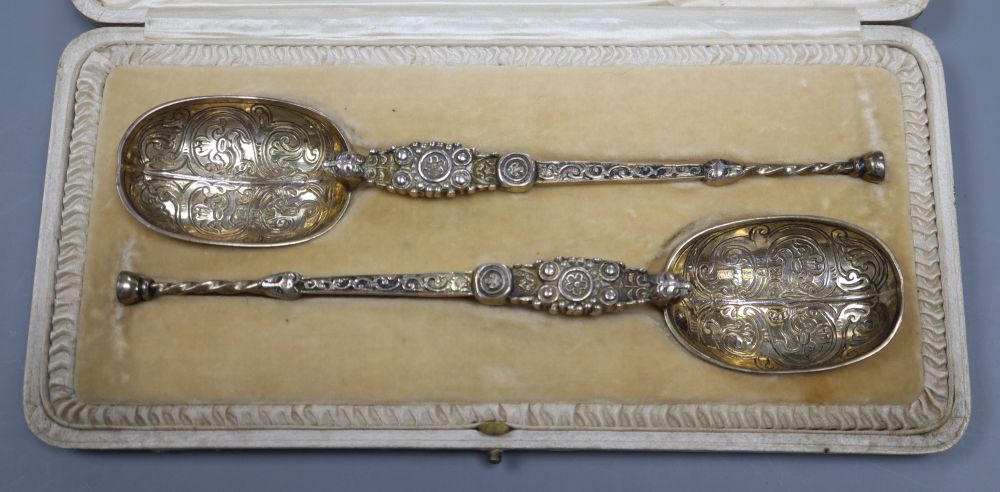 A cased pair of silver gilt replica coronation spoons, by R & S. Garrard, London 1910, 4.3oz.